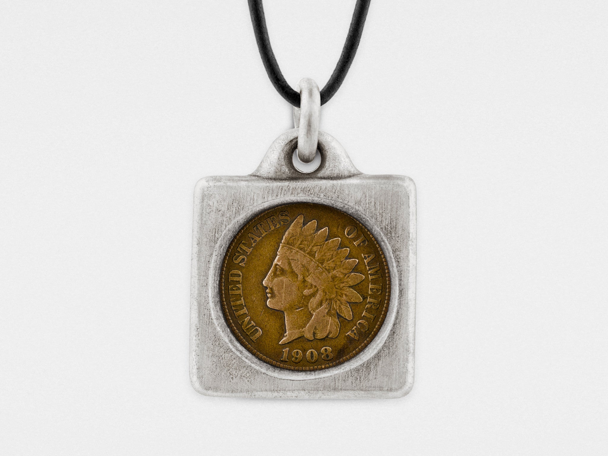 Moneda de un centavo Cabeza India en marco de plata colgante